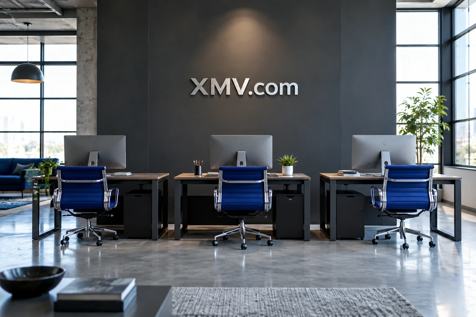 XMV.com displayed in a contemporary creative workspace